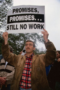 man at protest, still no work